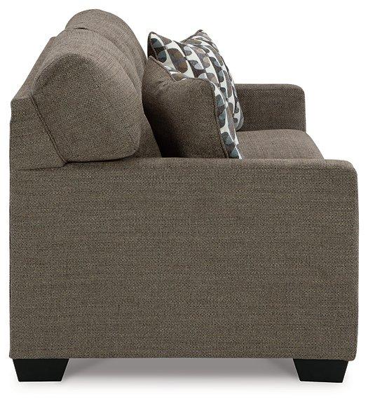 Mahoney sofa by Ashley Furniture featuring plush cushions, neutral upholstery, and a modern design perfect for living rooms.