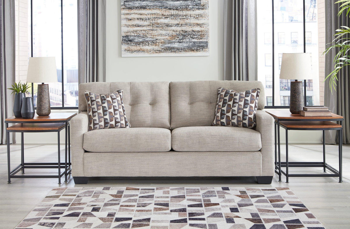Ashley Furniture Mahoney sofa with plush cushions and neutral upholstery, ideal for modern living room decor.