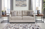 Ashley Furniture Mahoney sofa with plush cushions and neutral upholstery, ideal for modern living room decor.