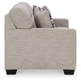 Comfortable Ashley Mahoney sofa with plush cushions and neutral fabric, perfect for modern living rooms.