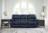 Ashley Furniture Leesworth power reclining sofa with plush cushions and fabric upholstery, shown in a closed reclined position.