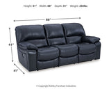 Ashley Furniture Leesworth power reclining sofa with plush fabric and padded armrests, shown in a cozy living room setting.