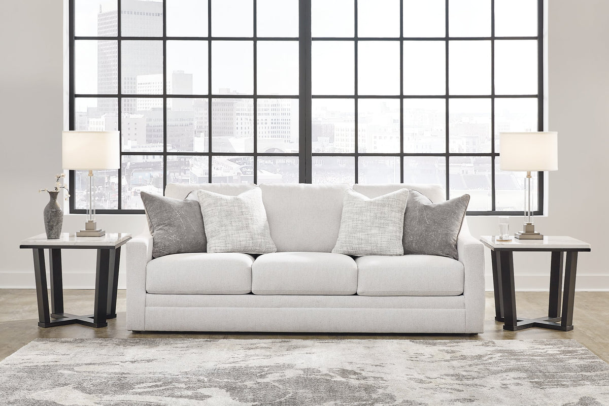 Ashley Furniture Adda sofa in neutral fabric with plush cushions and modern design, perfect for living room comfort.
