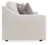 Ashley Furniture Adda sofa with beige upholstery and plush cushions, shown in a modern living room setting.