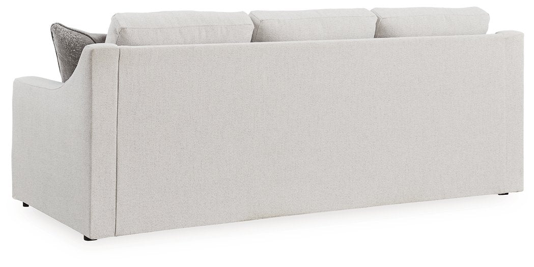 Adda sofa by Ashley Furniture, showing the back view with plush upholstery and modern design in a cozy living room setting.