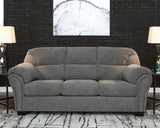 Allmaxx sofa by Ashley Furniture featuring plush cushions, modern design, and neutral fabric upholstery in a stylish living room setting.