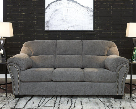 Allmaxx sofa by Ashley Furniture featuring plush cushions, modern design, and neutral fabric upholstery in a stylish living room setting.