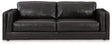Ashley Furniture Amiata sofa with plush cushions and neutral upholstery, shown from a front head-on angle.
