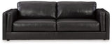 Ashley Furniture Amiata sofa with plush cushions and neutral upholstery, shown from a front head-on angle.