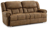 Ashley Furniture Boothbay power reclining sofa with plush cushions and dark upholstery, designed for comfort and stylish relaxation.
