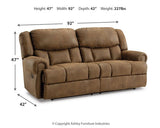 Ashley Furniture Boothbay reclining sofa with plush cushions and fabric upholstery, shown in a comfortable living room setting.