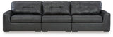 Ashley Furniture Brindley sectional sofa with plush cushions and modern design, shown in a cozy living room setting.