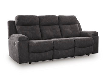 Ashley Furniture Brysonview reclining sofa with plush fabric, shown from an angle with closed recliners and LED lighting off.