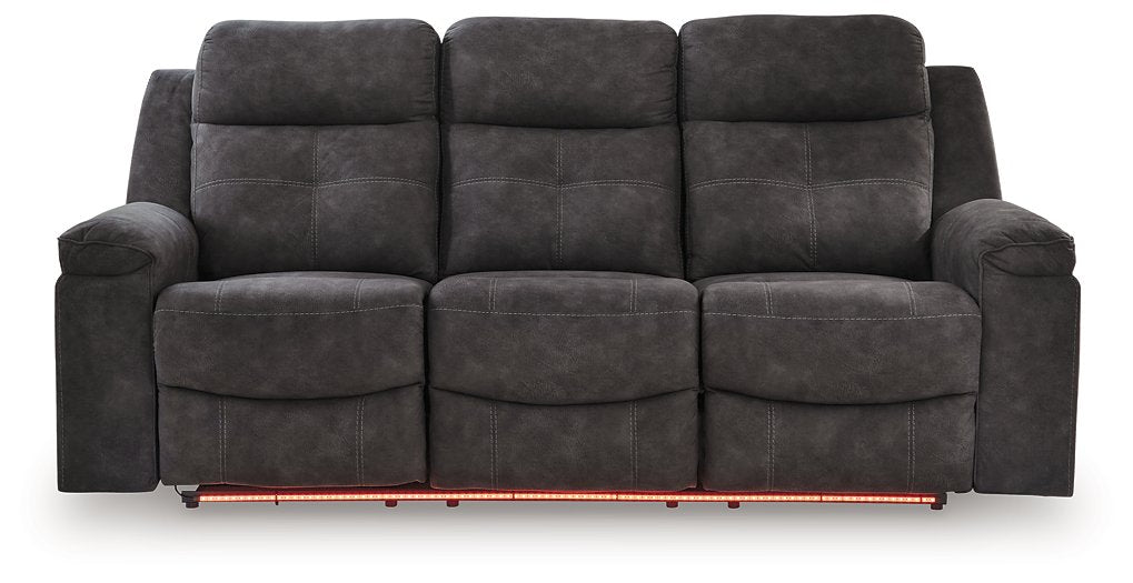 Ashley Furniture Brysonview reclining sofa with plush red upholstery, featuring a head-on view showing its comfortable design.