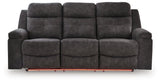 Ashley Furniture Brysonview reclining sofa with plush red upholstery, featuring a head-on view showing its comfortable design.