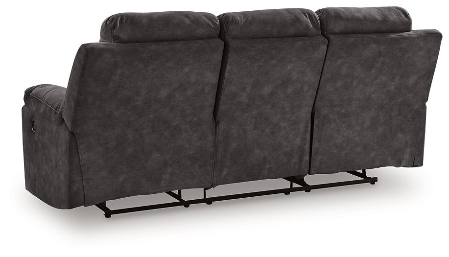 Ashley Furniture Brysonview reclining sofa with plush cushions and reclining feature, shown from the back view.