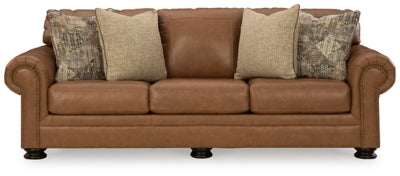 Ashley Furniture Carianna sofa with plush cushions and neutral fabric, shown from a head-on angle.