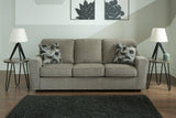 Ashley Furniture Cascilla sofa with plush cushions and neutral fabric, shown in a stylish living room setting.