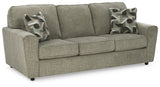 Ashley Furniture Cascilla sofa shown from an angle, featuring plush cushions and stylish fabric upholstery.