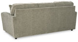 Ashley Furniture Cascilla sofa with plush back cushions and sleek design, shown from the rear view.