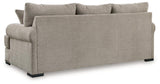 Ashley Furniture Galemore Sofa with plush fabric and cushioned armrests, shown in a modern living room setting.