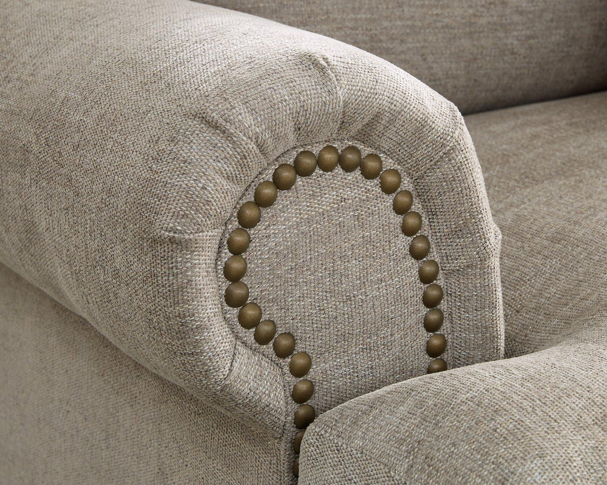 Ashley Furniture Galemore sofa with plush fabric and modern design, featuring wide armrests and comfortable seating.