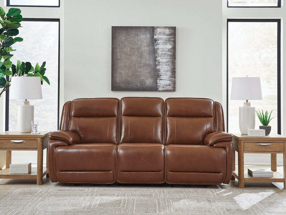 Healy Pier reclining sofa by Ashley Furniture with plush cushions and a modern design, shown in a cozy living room setting.