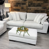 Ashley Furniture Newport sofa with plush cushions and modern design, shown in a living room setting.
