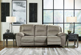 Ashley Furniture Next-Gen Gaucho reclining sofa with plush cushions and modern design, shown in a cozy living room setting.