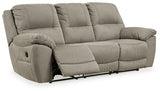 Ashley Furniture Next-Gen Gaucho Reclining Sofa with plush fabric upholstery and modern design, showing the sofa in a living room setting.