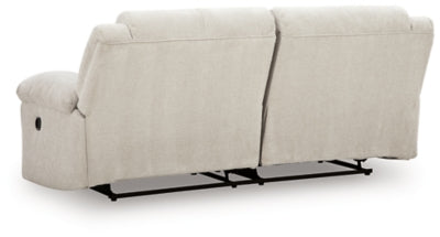Ashley Furniture Orlen reclining sofa with plush cushions and dark upholstery, shown from the back view.