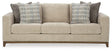 Ashley Furniture Parklynn sofa with plush cushions and modern design, shown in a cozy living room setting.