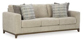 Ashley Furniture Parklynn sofa with plush cushions and neutral fabric, showcasing a modern living room setup.