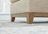 Ashley Furniture Parklynn Sofa with plush fabric and modern design, featuring tufted cushions and wide armrests.