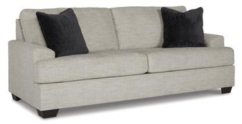 Ashley Furniture Vayda sofa with plush cushions and modern design, shown in a cozy living room setting.