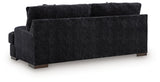 Ashley Furniture Whitmore Manor sofa with plush fabric and elegant design, shown from the back angle.