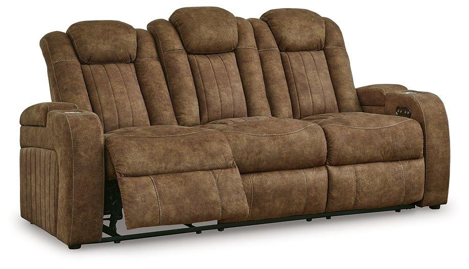 Ashley Furniture Wolfridge power reclining sofa with plush fabric and padded armrests, perfect for comfortable living room seating.