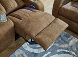 Ashley Furniture Wolfridge Power Reclining Sofa with plush cushions and reclining seats, shown in a modern living room setting.