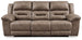Ashley Furniture Stoneland Power Reclining Sofa with plush cushions and reclining features, shown in a modern living room setting.