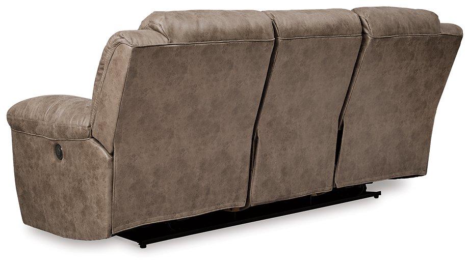 Ashley Furniture Stoneland Power Reclining Sofa with plush cushions and reclining features, shown in a modern living room setting.