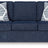 Ashley Furniture Evansley sofa with plush cushions and neutral upholstery, showcased in a modern living room setting.