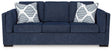 Ashley Furniture Evansley sofa with plush cushions and neutral upholstery, showcased in a modern living room setting.