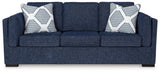 Ashley Furniture Evansley sofa with plush cushions and neutral upholstery, showcased in a modern living room setting.