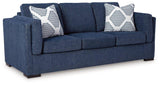Ashley Furniture Evansley sofa with plush cushions and a modern design, shown in a stylish living room setting.