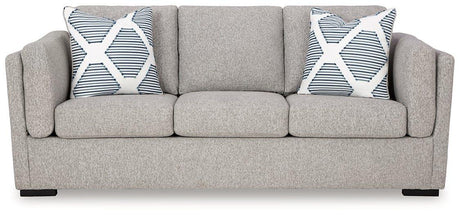 Ashley Furniture Evansley Sofa with plush fabric, modern design, and wide armrests, perfect for living room comfort.