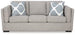 Ashley Furniture Evansley Sofa with plush fabric, modern design, and wide armrests, perfect for living room comfort.