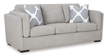 Ashley Furniture Evansley Sofa with plush cushions and neutral fabric, showcasing a modern, comfortable living room piece.