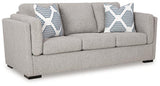 Evansley sofa by Ashley Furniture featuring plush cushions, neutral fabric, and a modern design in a stylish living room setting.