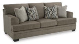 Ashley Furniture Stonemeade sofa with plush cushions and neutral fabric, shown in a modern living room setting.