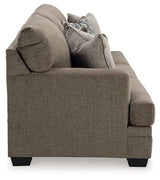 Ashley Furniture Stonemeade sofa with plush cushions and neutral fabric, showcasing a modern living room setup.